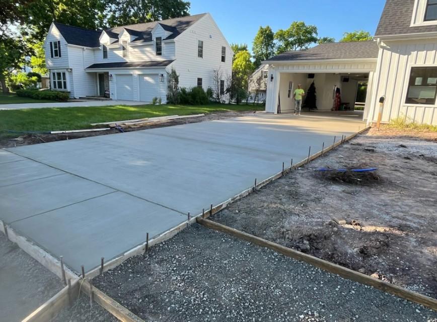 Professional concrete contractor installing residential driveway in La Porte, TX
